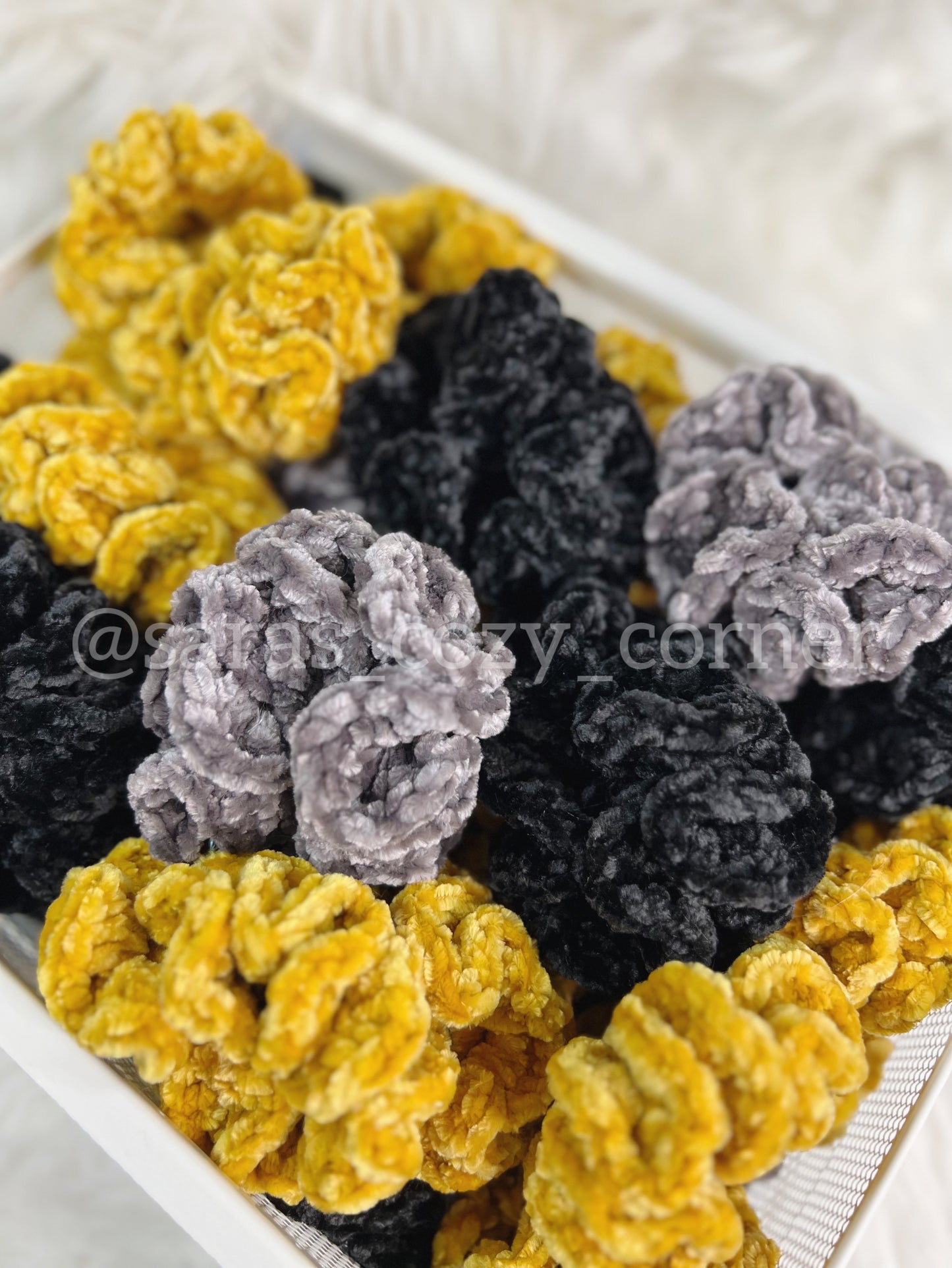 The Velvet Charm scrunchies golden moss