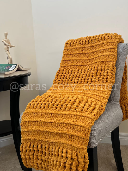 The Amber Warmth throw