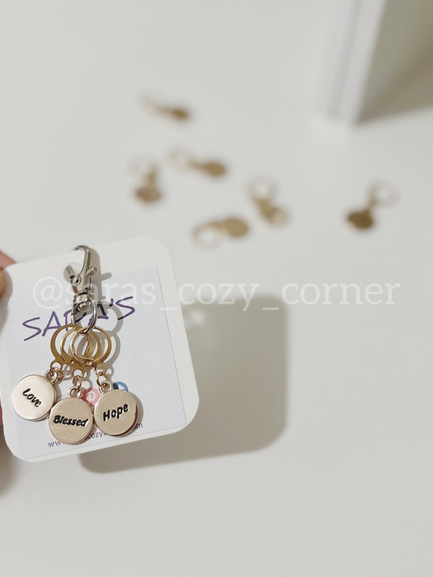 The Motivational charms stitch markers