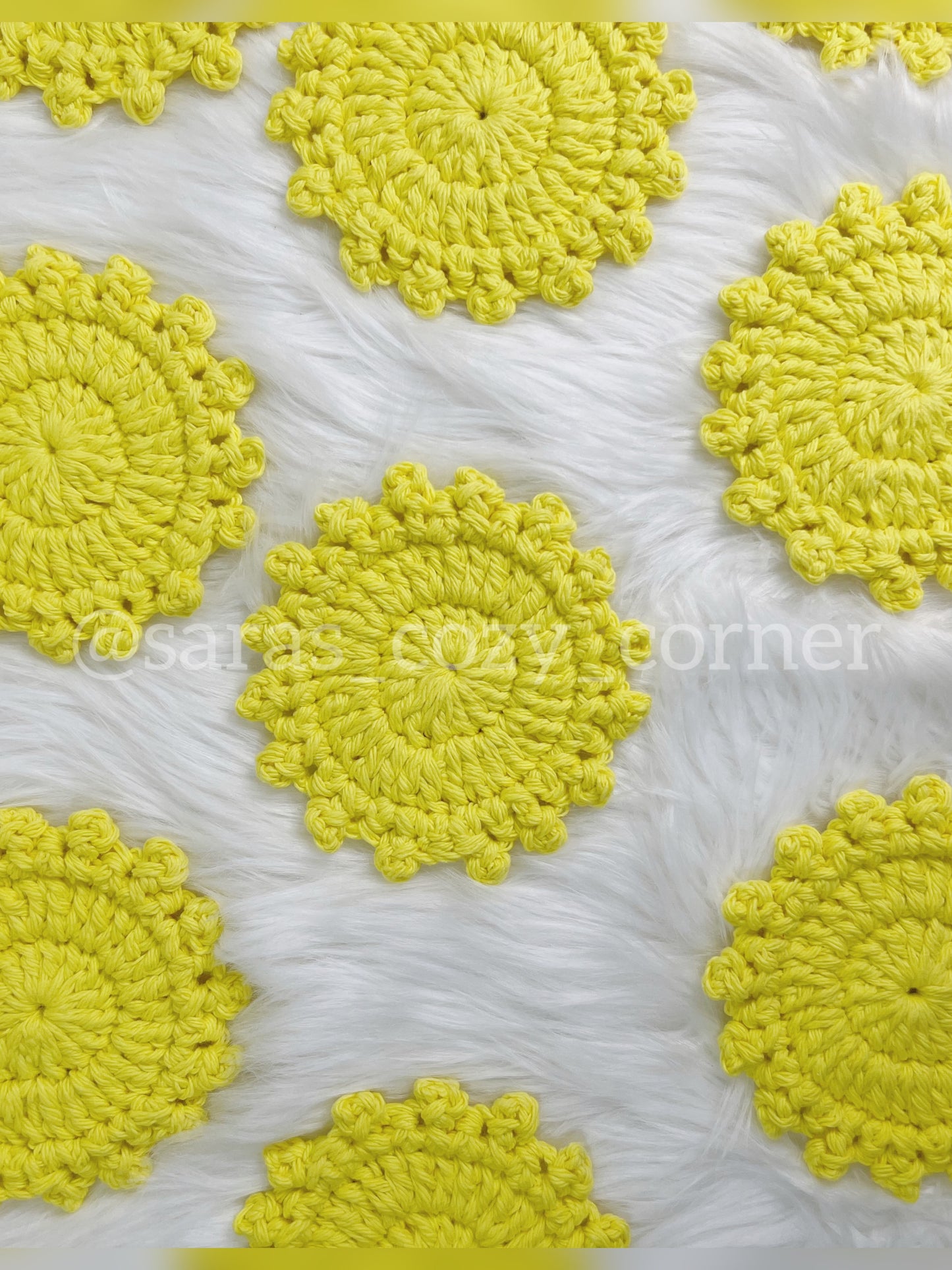 Bright yellow crochet cotton coaster