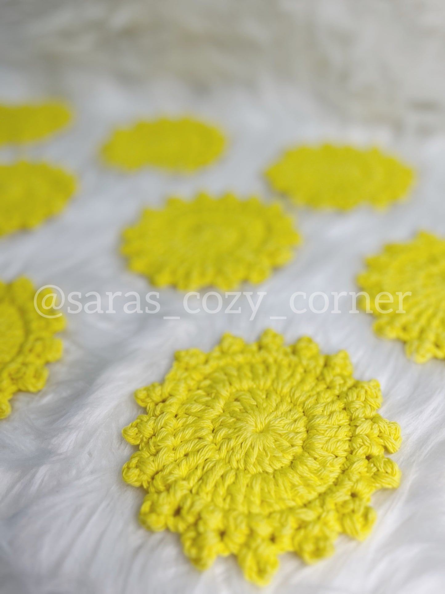 Bright yellow crochet cotton coaster