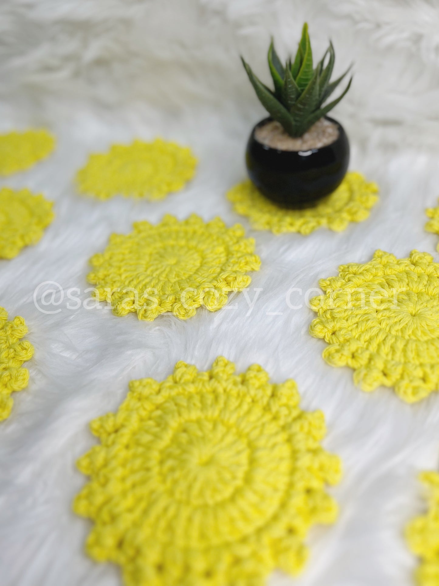 Bright yellow crochet cotton coaster