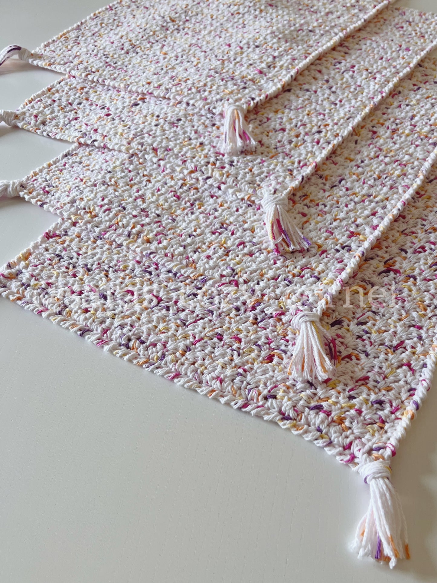 Floral prints crochet placemat with tassels