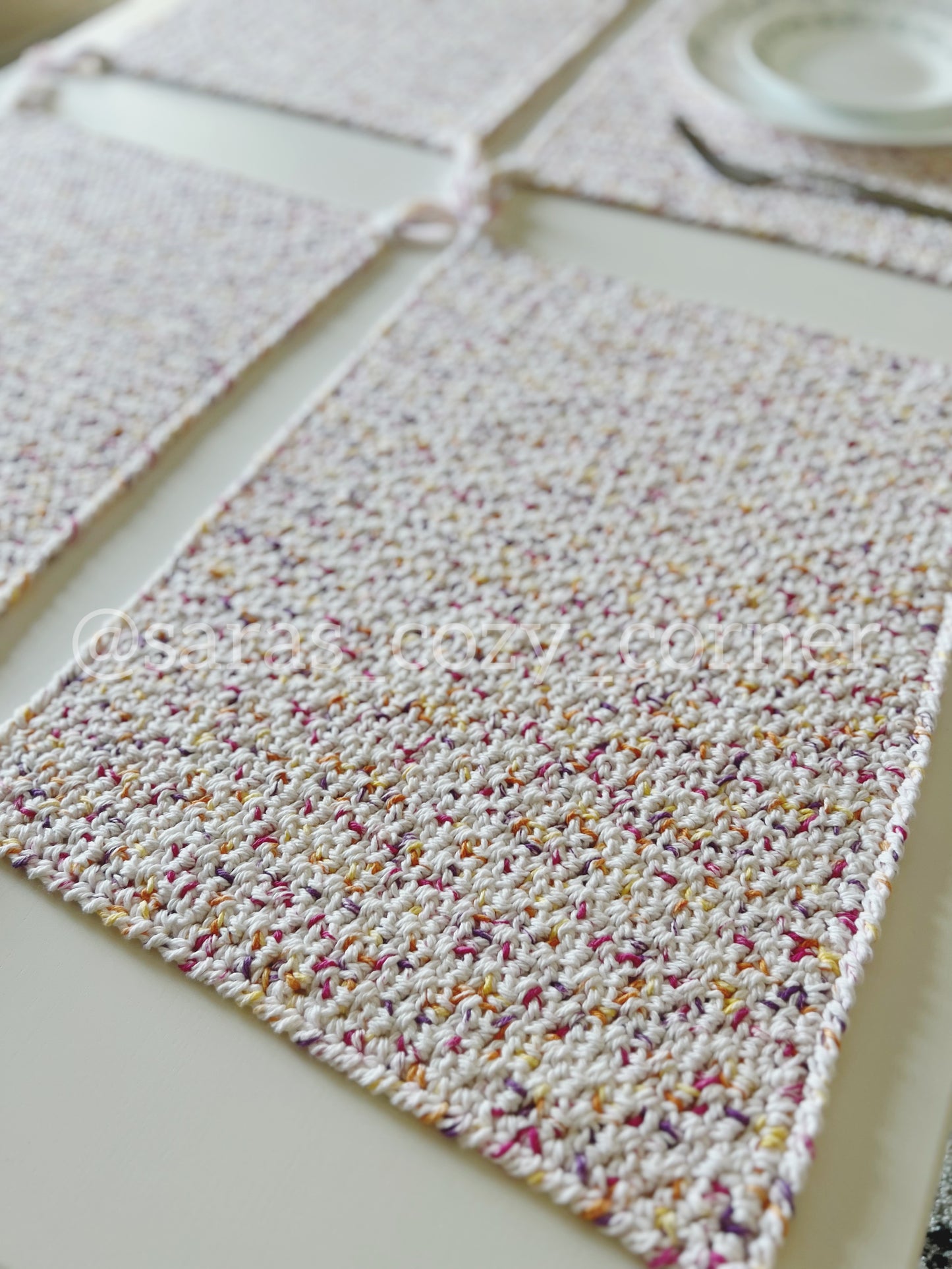 Floral prints crochet placemat with tassels