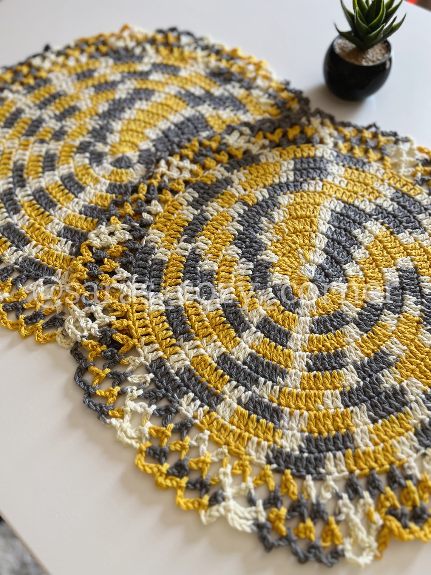 Crochet lace border golden yellow grey placemat