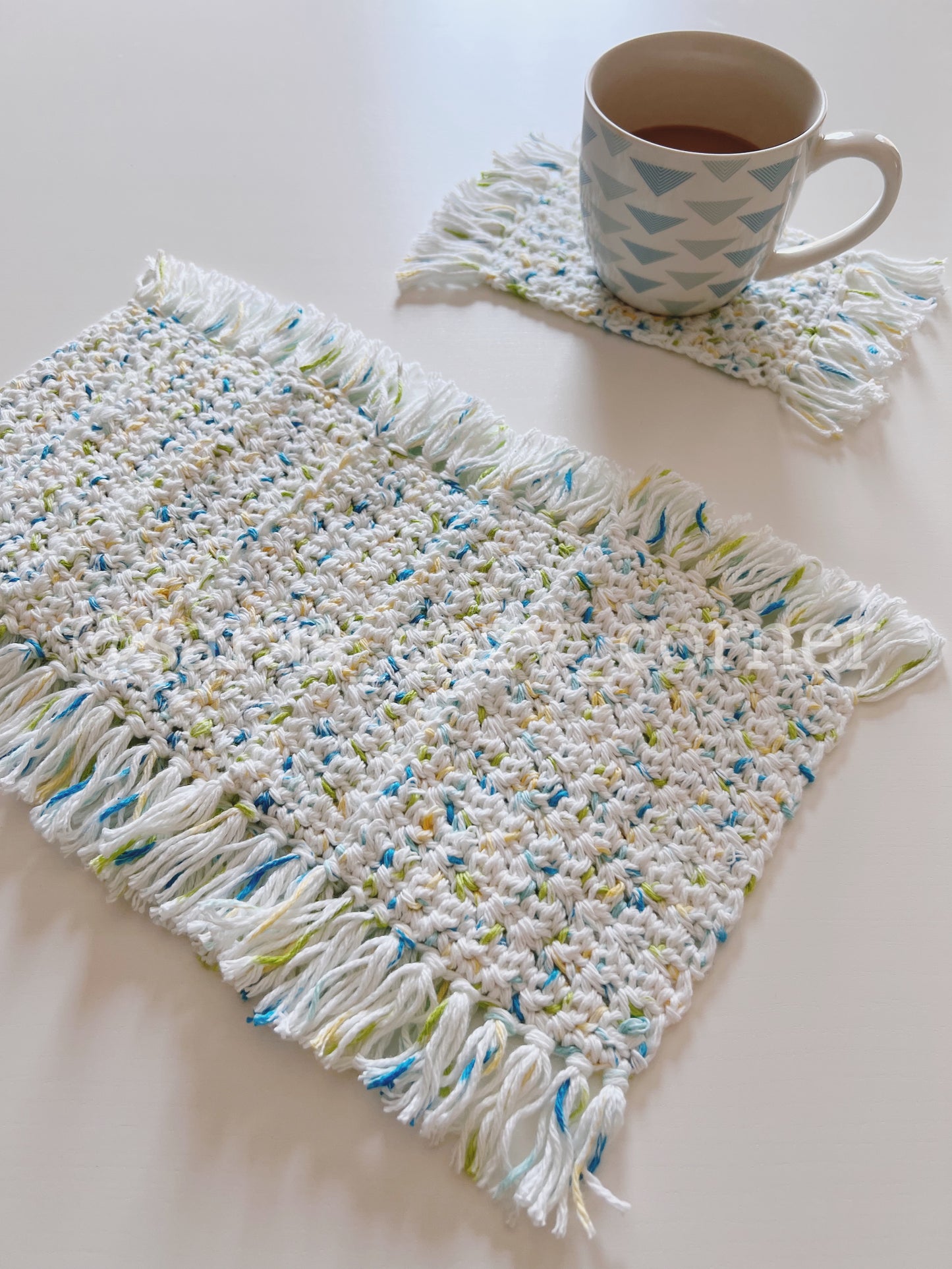 The Summer Prints crochet mug rug